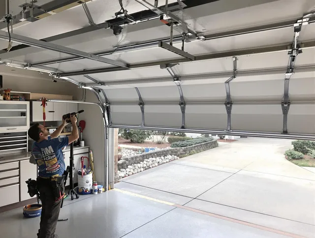 Garage door track repair service by Columbus Garage Door Repair in Columbus